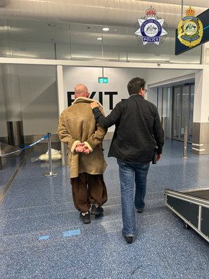 Australian man charged with child sex offences after airport luggage find