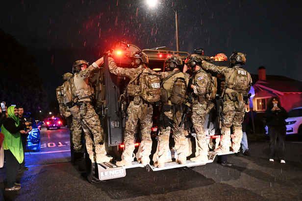 FBI swarms home thousands of kilometres from White House