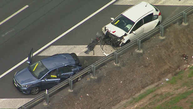 Man fighting for life after being hit while stopped on Queensland motorway